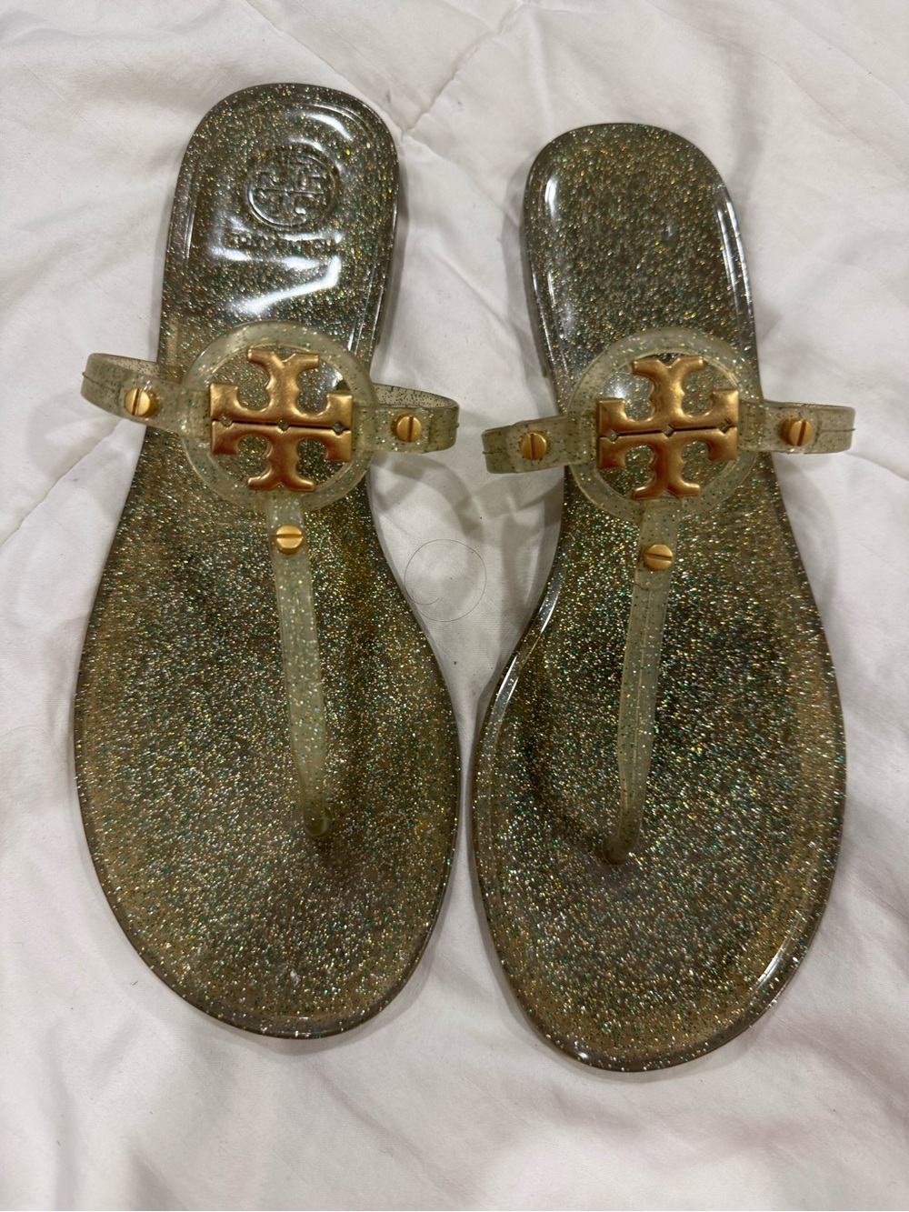 Tory Burch Glitter Jelly Thong Sandals in Gold Glitter with Gold Logo